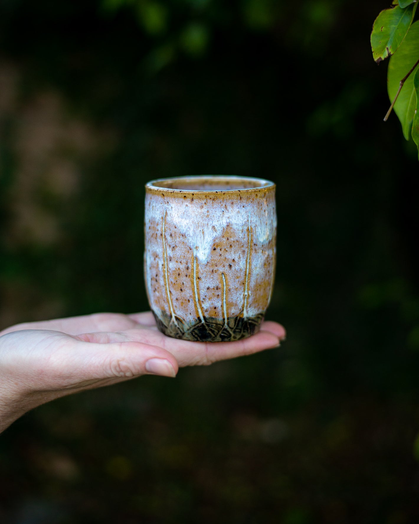 The Roots Tumbler which is a beautiful functional pottery piece by Dirtbag Ceramics. Inspired from the Pacific Crest Trail (PCT) and Continental Divide Trail (CDT)